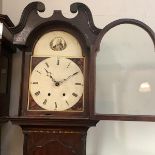 An early 19th century mahogany longcase clock, the unusual painted wooden dial with Roman numerals