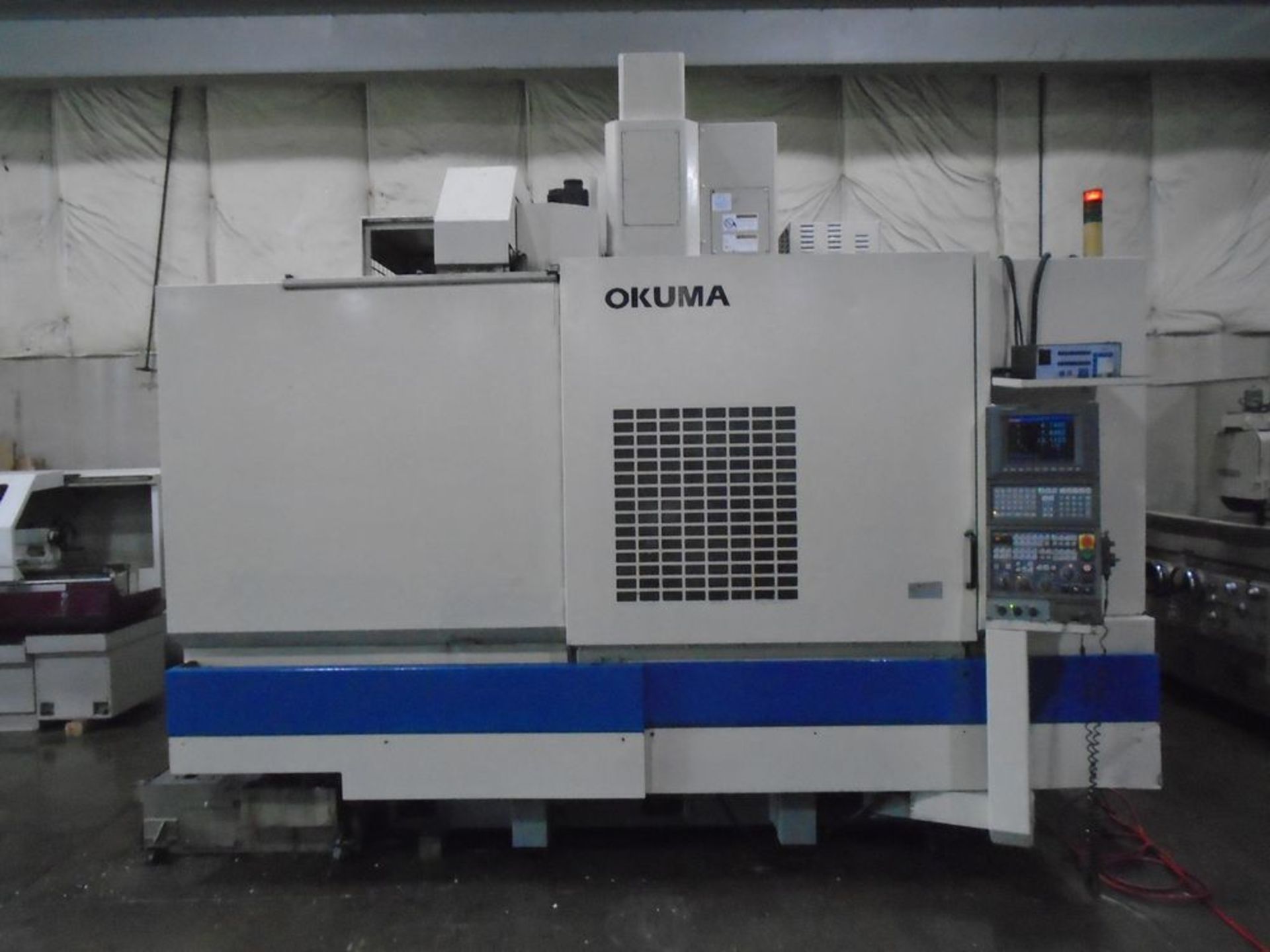 2000 Okuma MA-650VB OSP U100M 4 Axis Table Size: 60.24” x 26” Load Capacity: 3,300 Lbs. Distance - Image 2 of 7