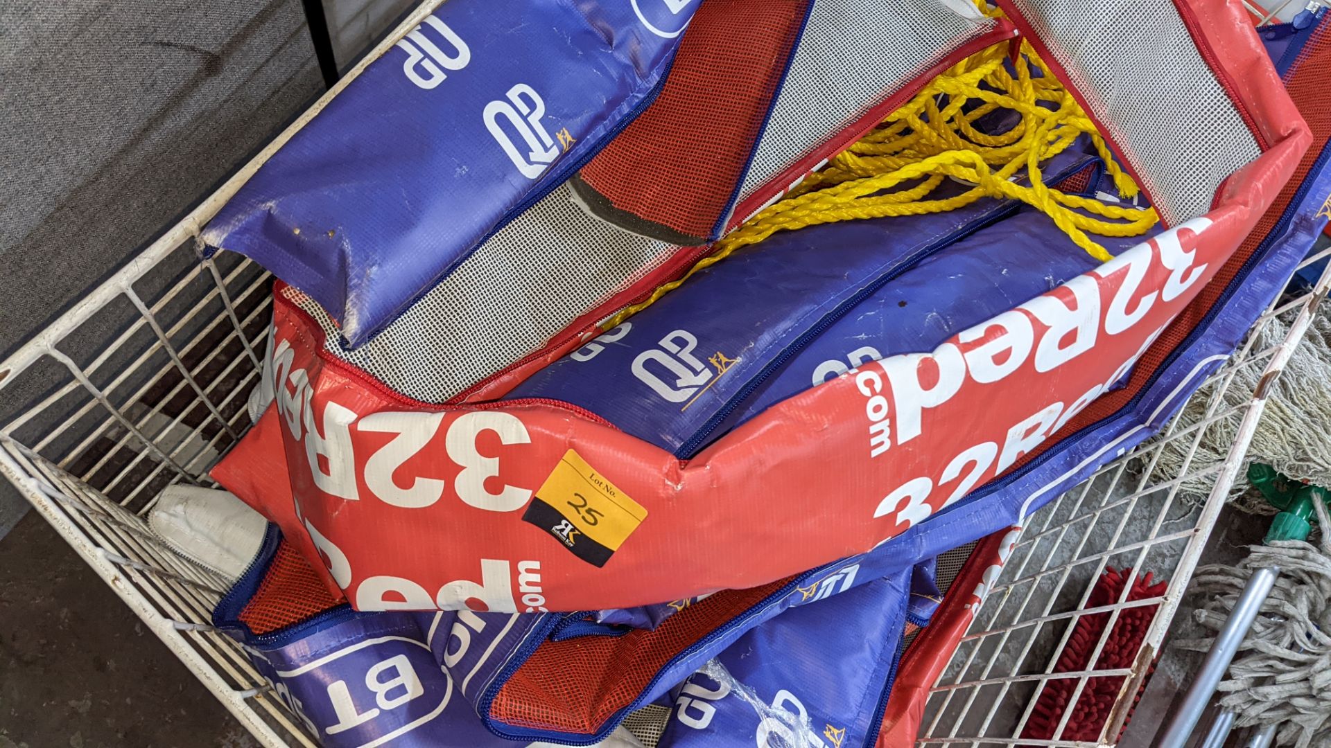The contents of a cage of boxing ring rope covers, marked 32 red, BT Sport, etc - Image 4 of 6