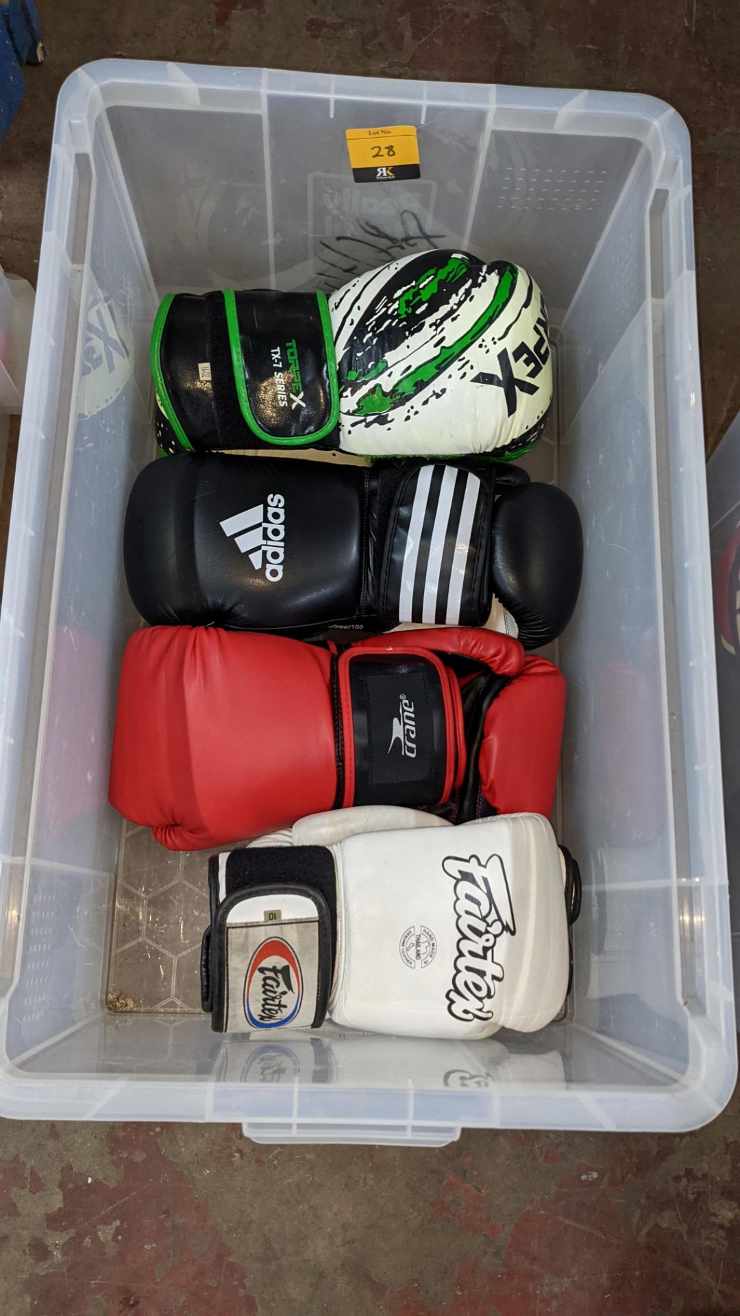 4 pairs of boxing gloves by Torpex, Fairtex, Crane & Adidas. NB please note rip to one of the Torpe