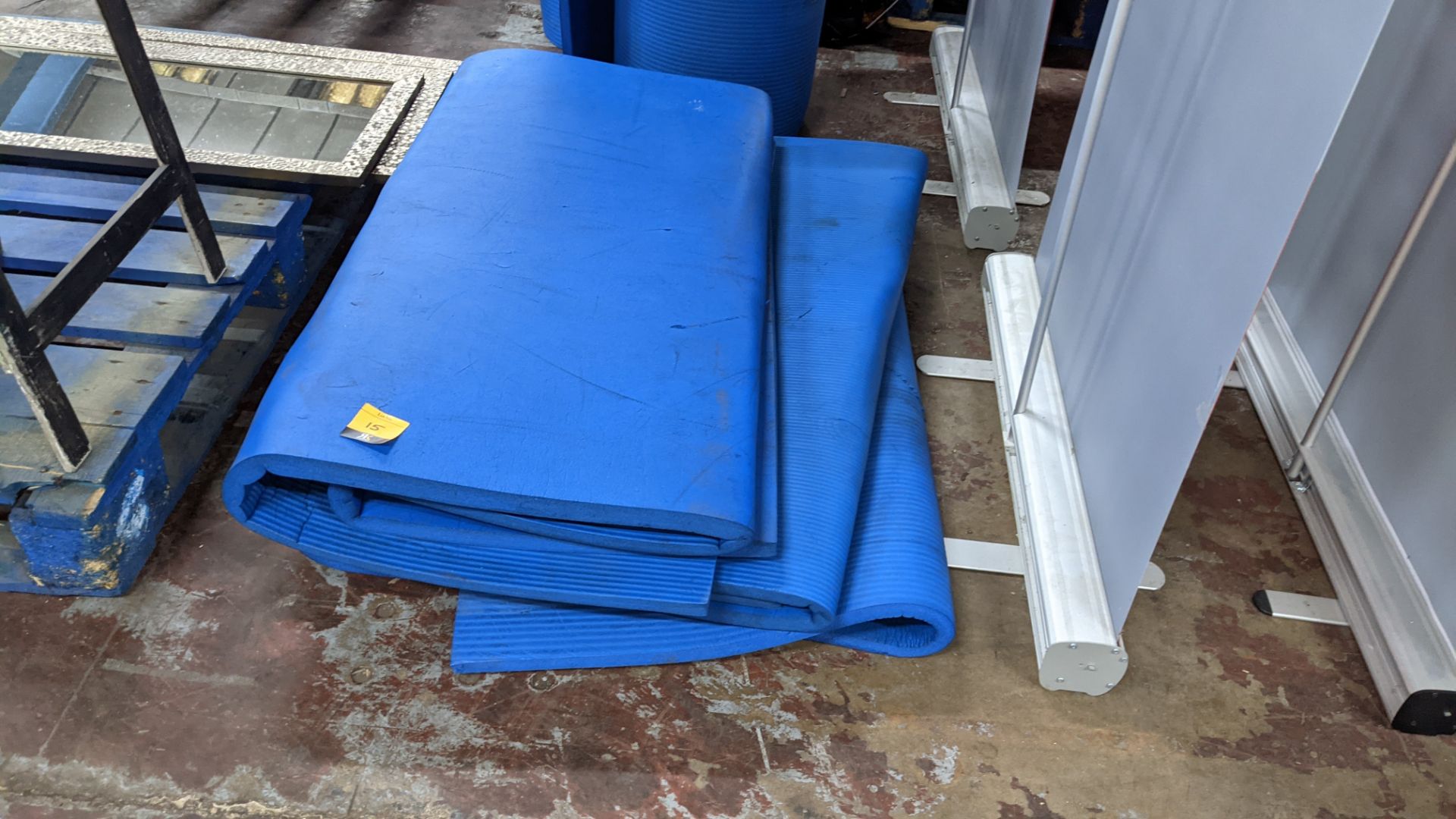 3 off blue foam exercise mats, each measuring approximately 2m x 1m