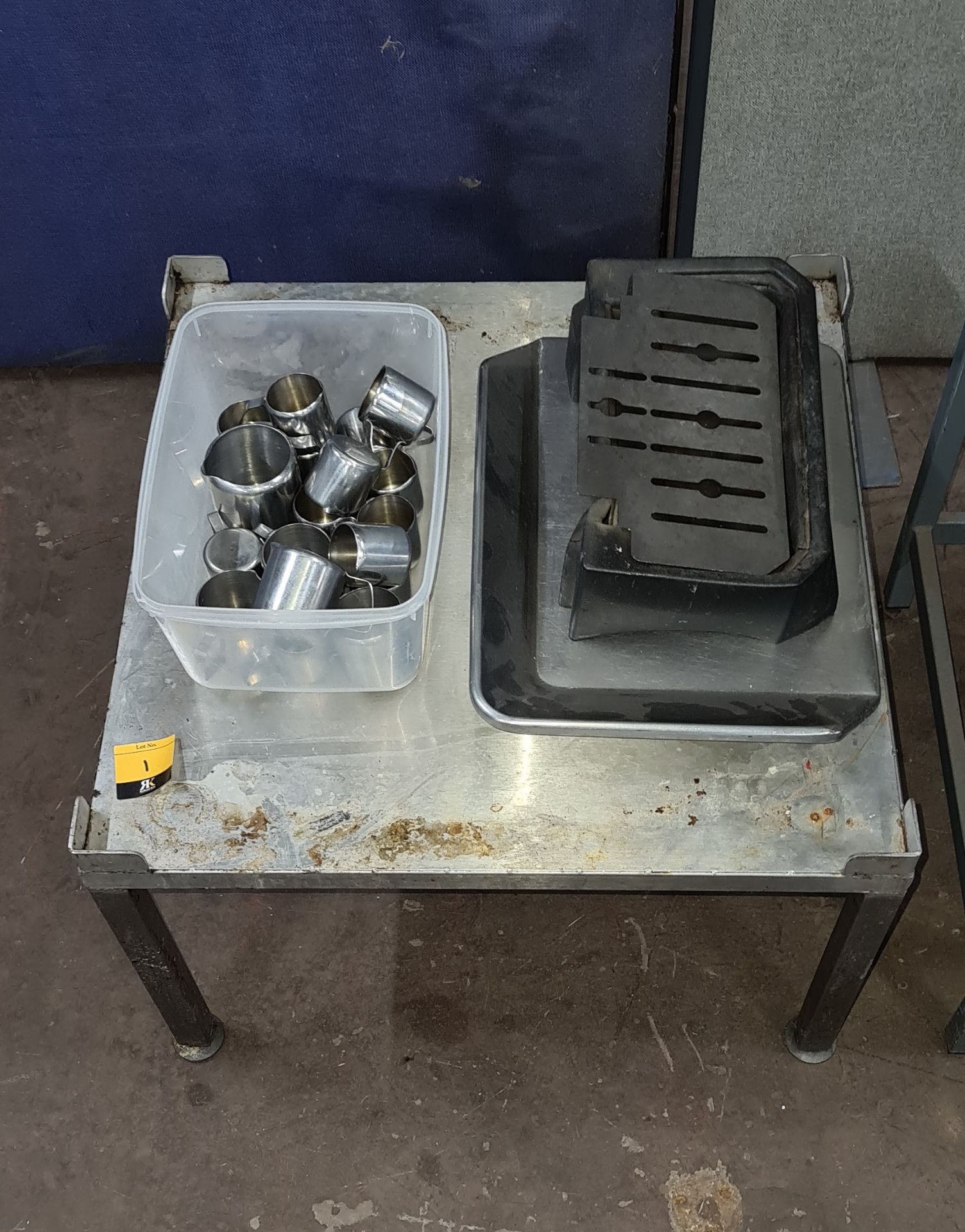 Metal stand, quantity of jugs & other miscellaneous items as pictured