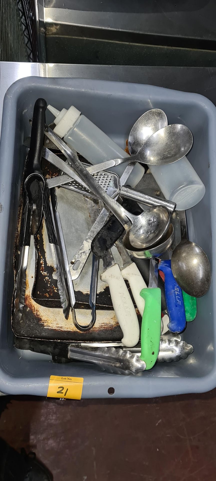 Tray of assorted kitchen utensils