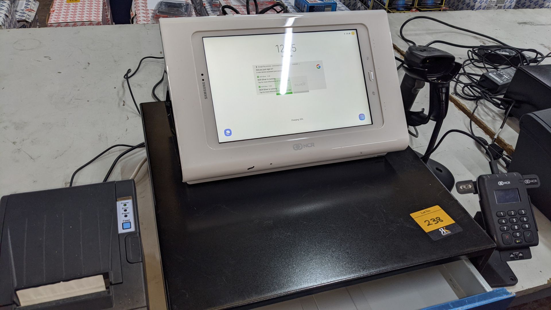 NCR Silver Quantum QR1000 point of sale terminal comprising Samsung tablet, terminal to hold the Sam