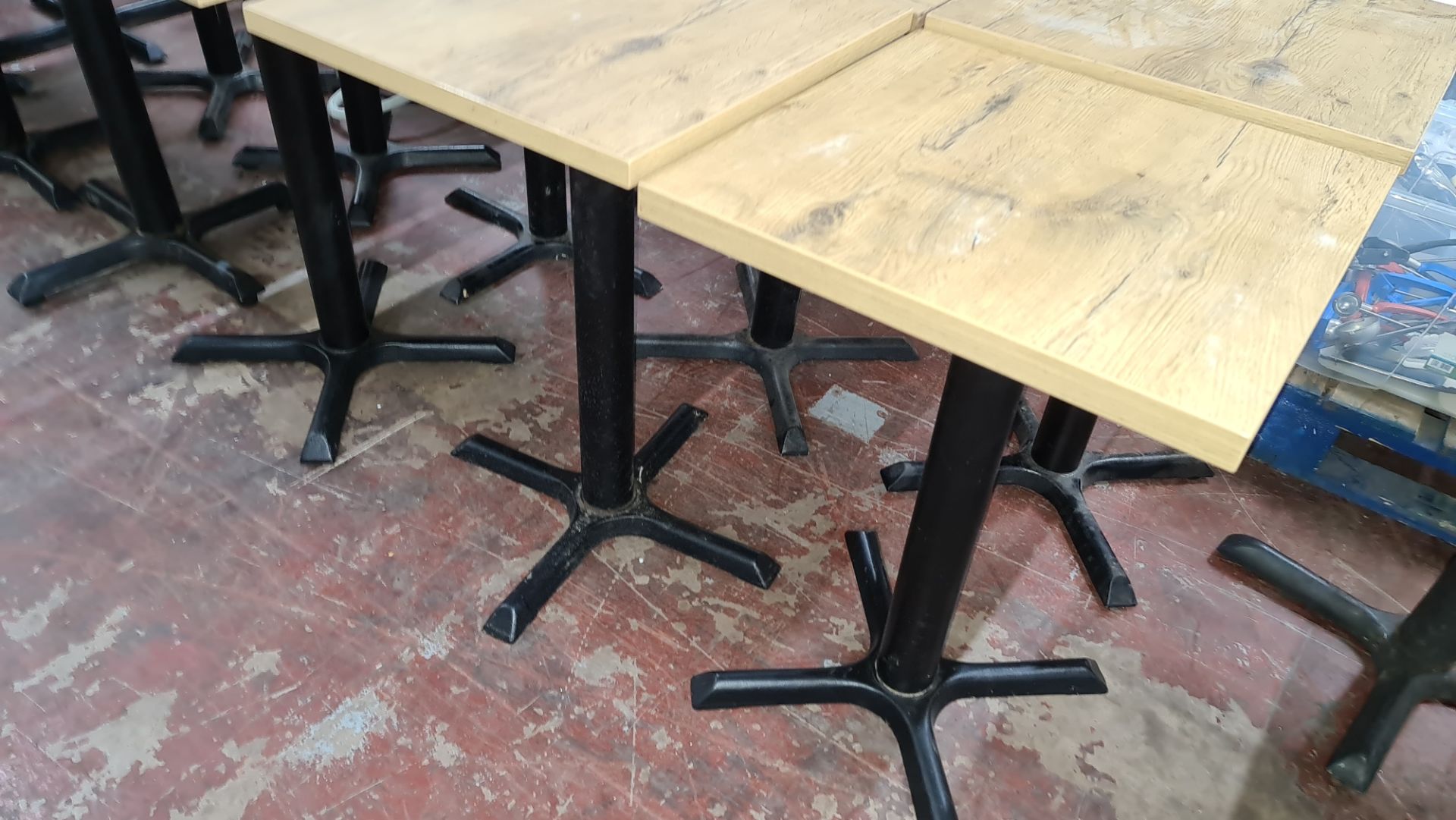 16 off matching café tables with black metal single pedestal bases & wooden tops each 500mm square - Image 2 of 7