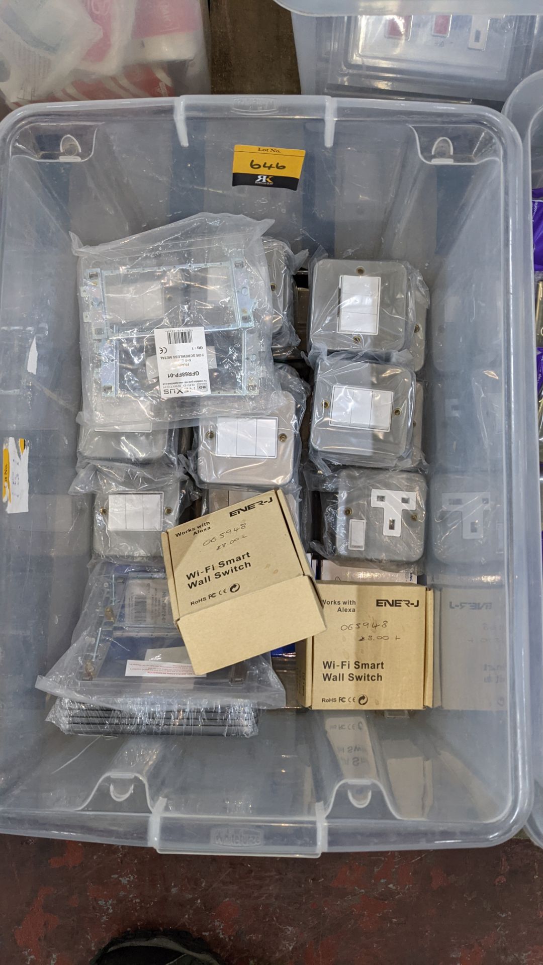 The contents of a crate of assorted sockets & switches. NB crate excluded
