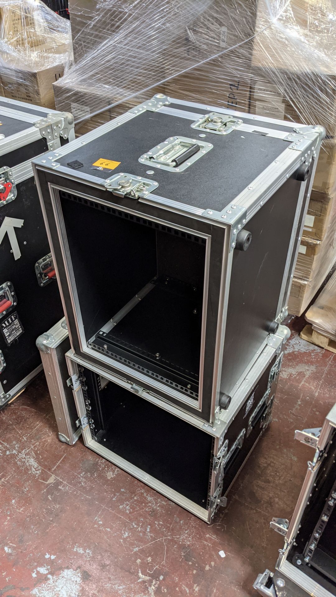 2 off racks comprising 1 off 8U & 1 off 10U, both incorporated into flight cases, one with a clip on