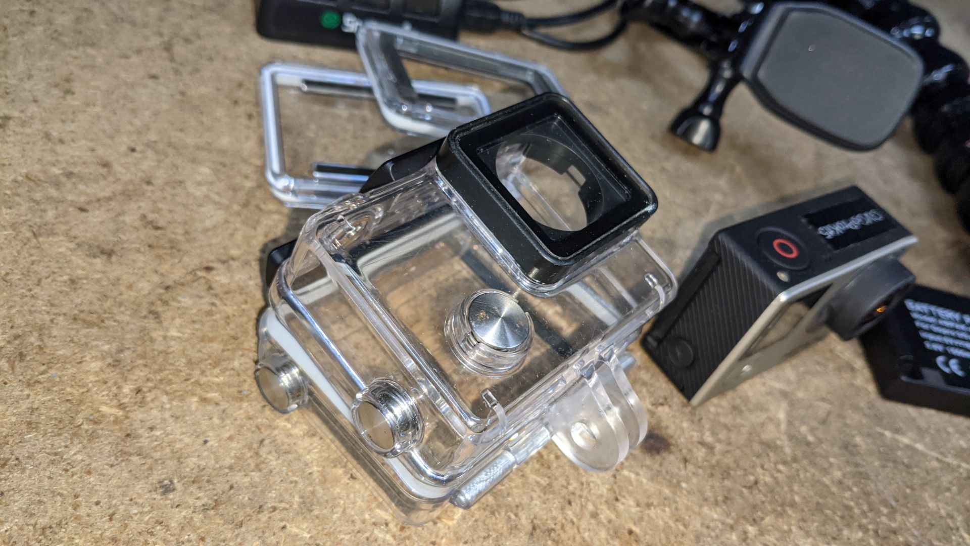 GoPro Hero 4 camera kit comprising GoPro Hero 4 plus wide variety of batteries, chargers, cases & mo - Image 11 of 15