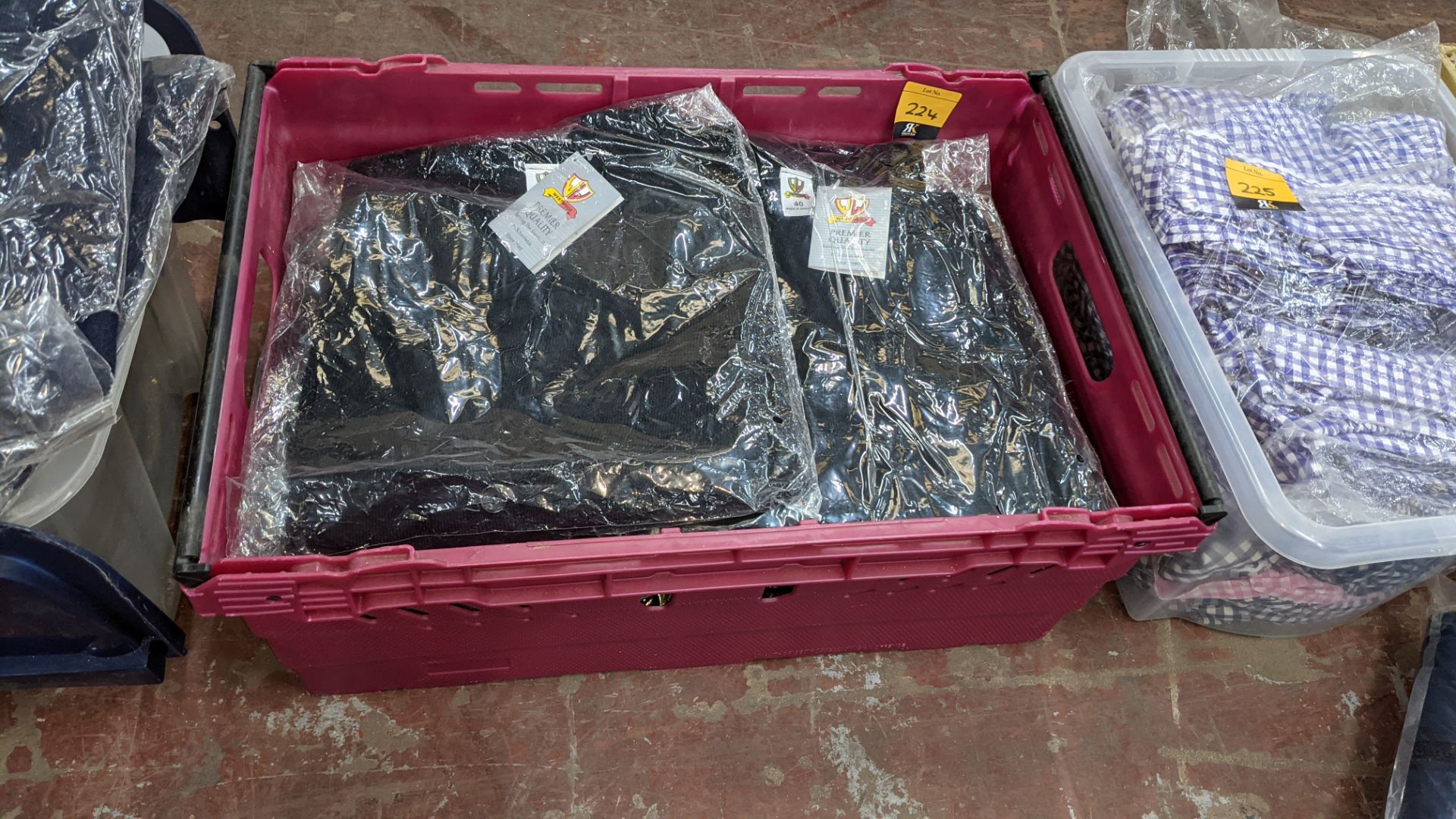 Approx 10 off children's black cardigans - the contents of 1 crate. NB crate excluded