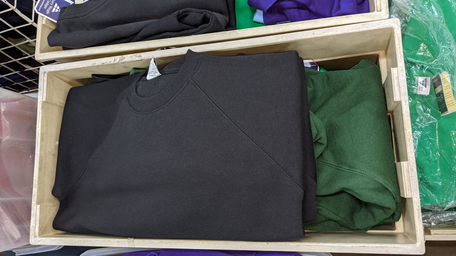 The contents of 5 crates of assorted children's sweatshirts, polo shirts & other school clothing. - Image 7 of 8