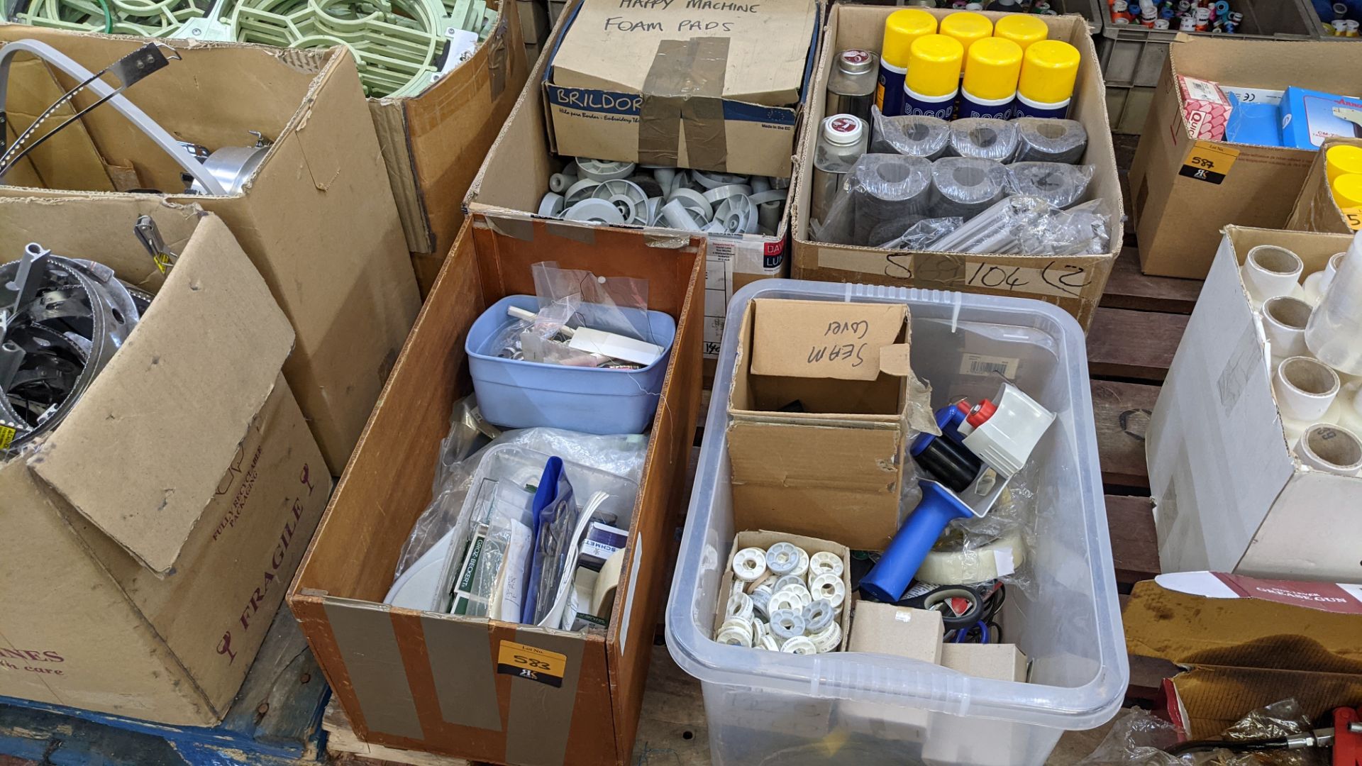 4 boxes/crates of assorted textile machinery related spares, cleaning solutions, lubricants & more