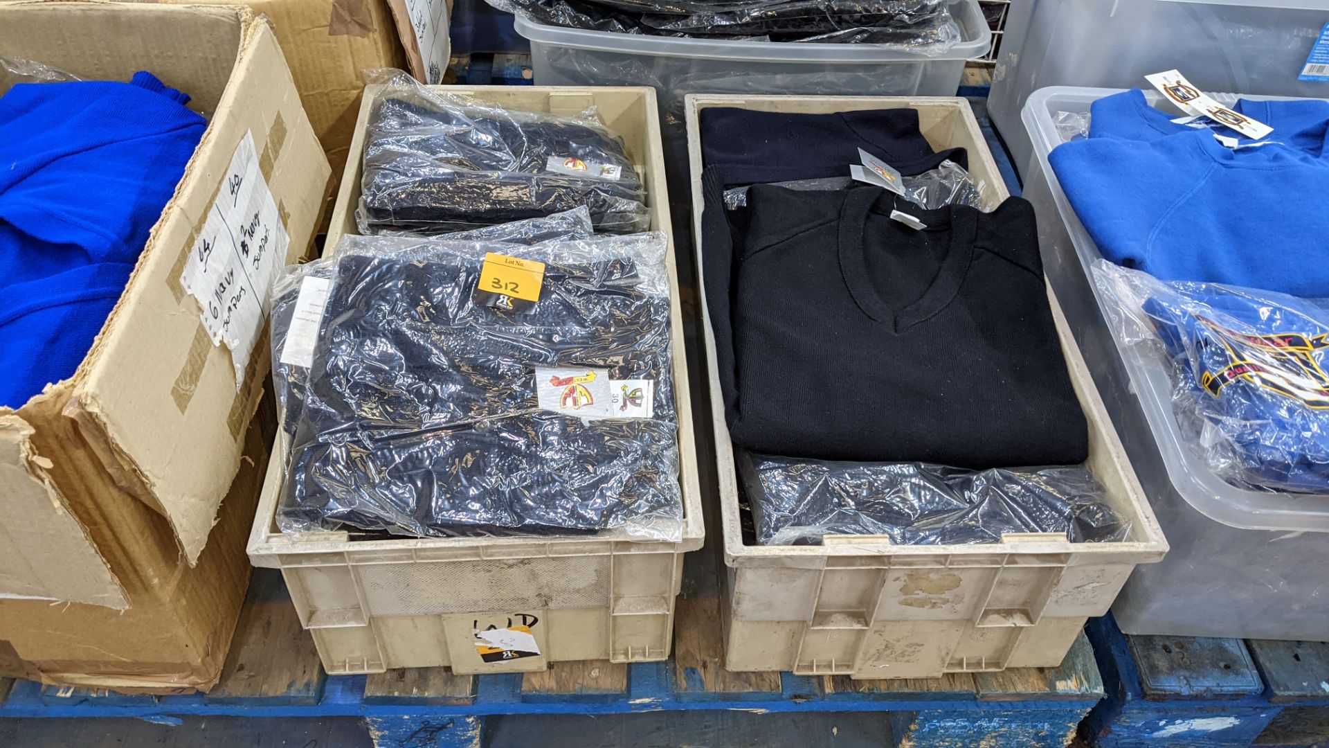 Approx 27 off button up children's navy tops & similar - the contents of 2 crates. NB crates exclud