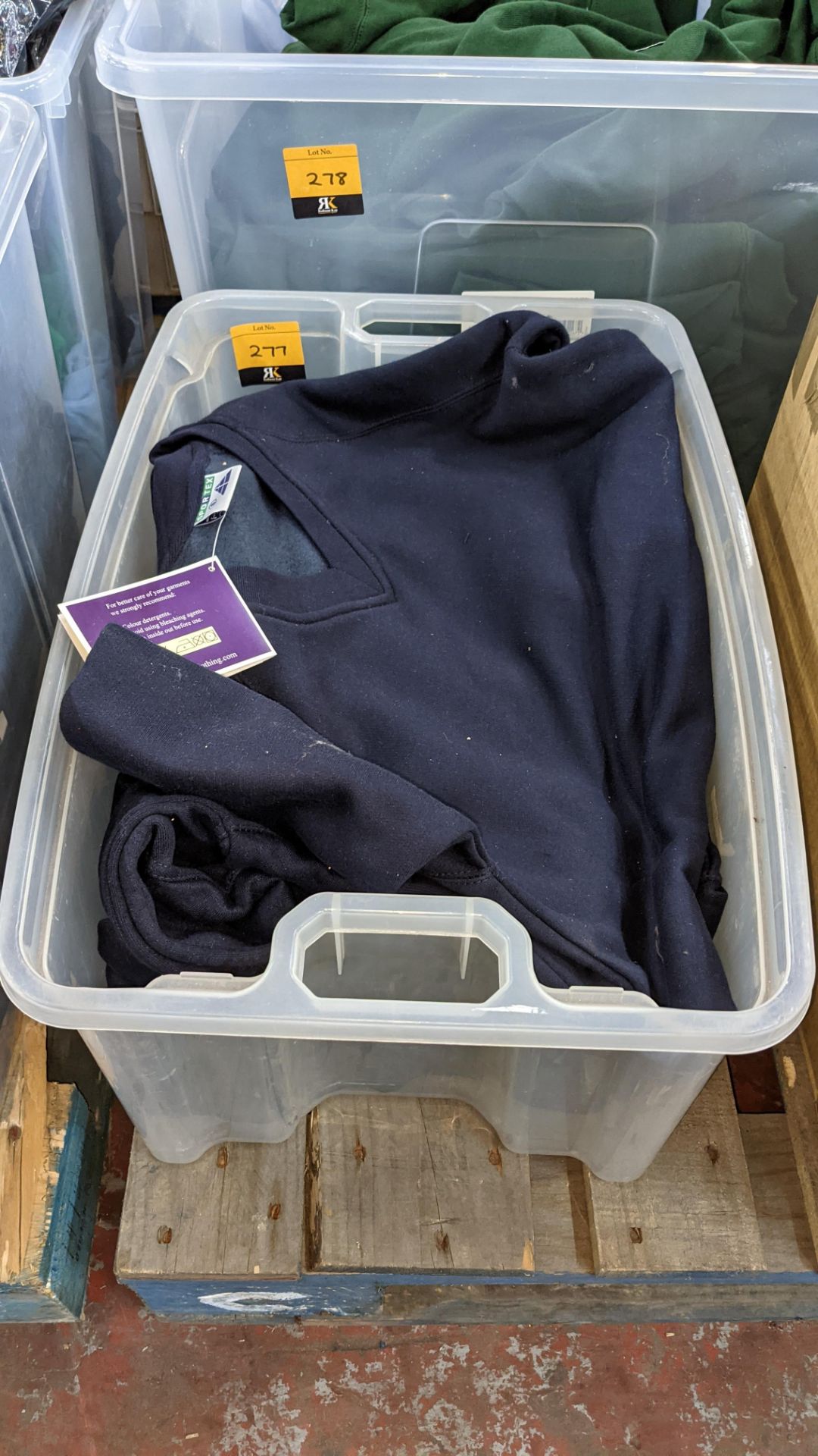 Approx 6 off navy V neck sweatshirts - the contents of 1 crate. NB crate excluded