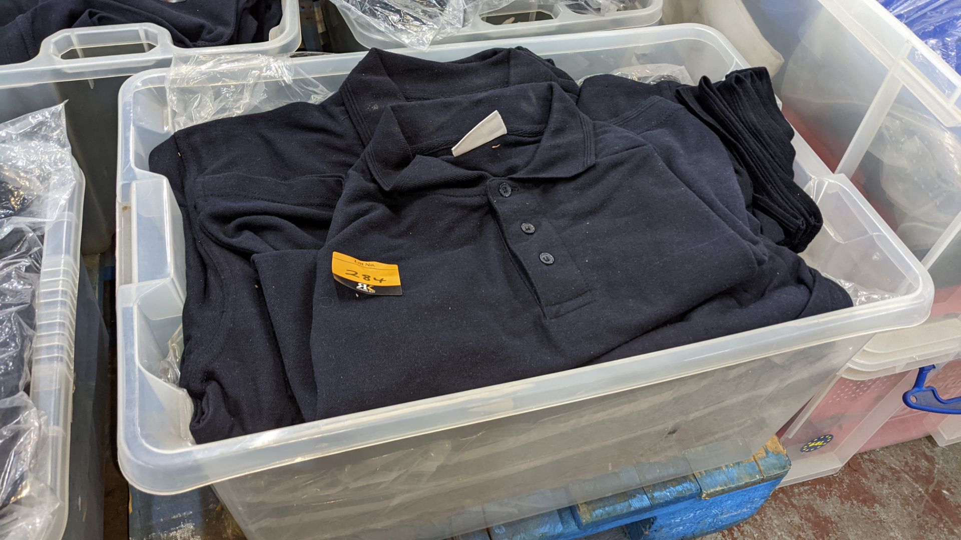 The contents of a crate of navy polo shirts. NB crate excluded - Image 2 of 5