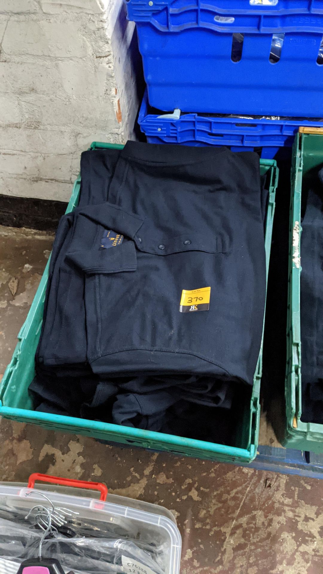 Approx 20 off Uneek navy polo shirts