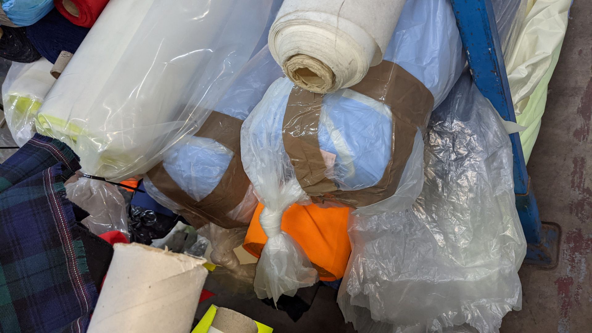 The contents of a large stillage of fabric including quantity of high visibility cloth. Please note - Image 6 of 12