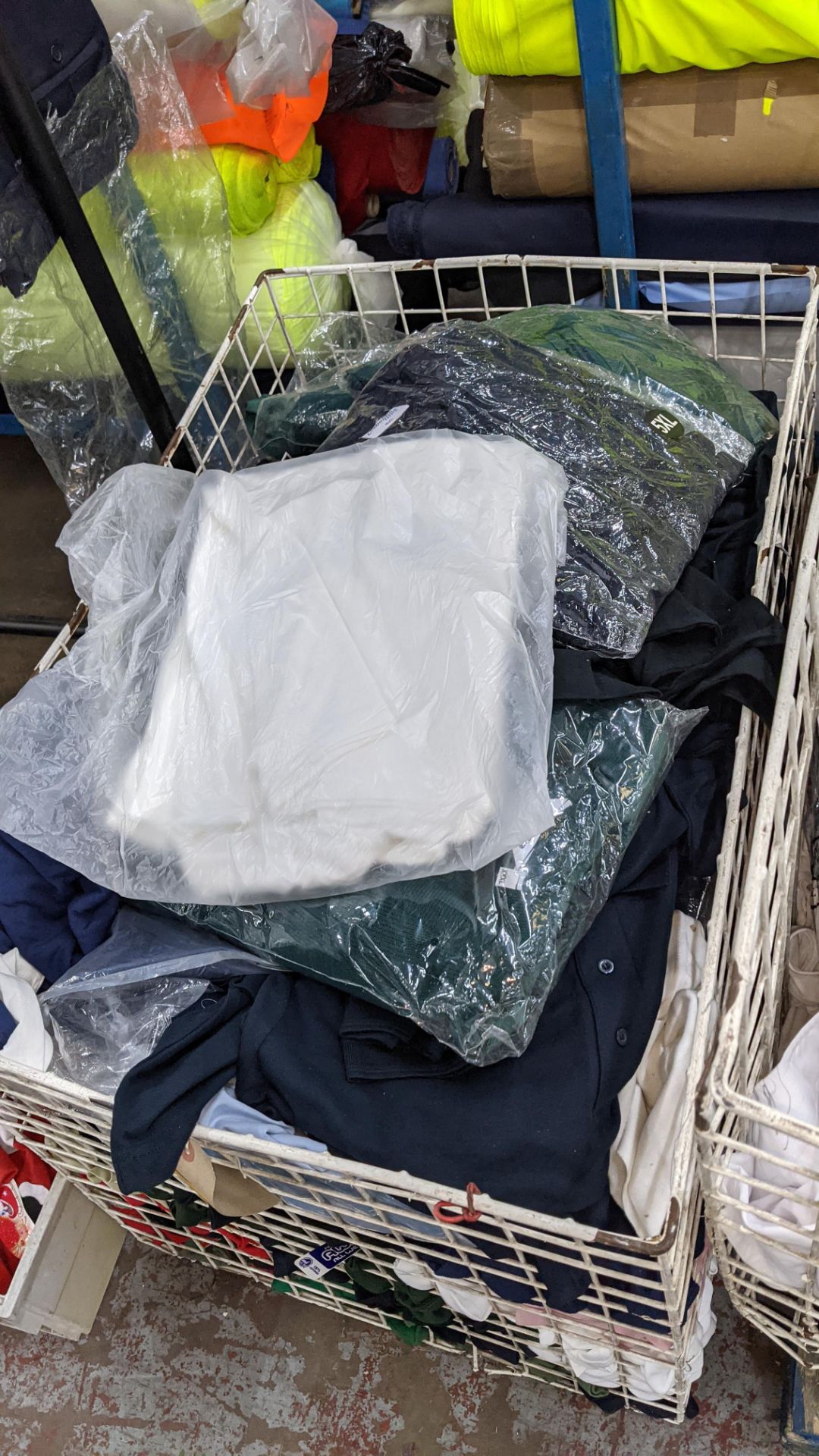 The contents of a cage of assorted adults garments. NB cage excluded - Image 6 of 6