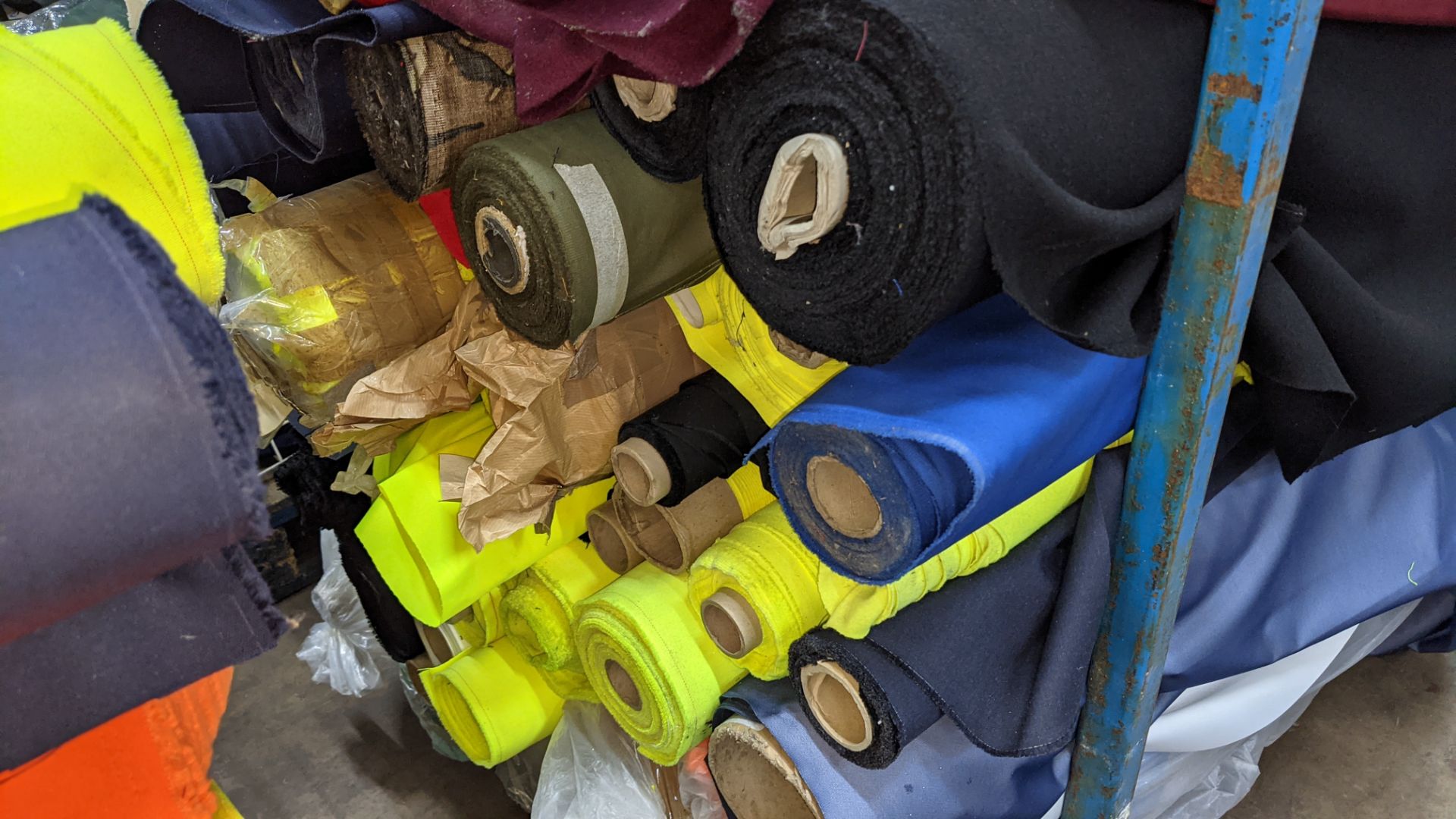 The contents of a large stillage of fabric including quantity of high visibility cloth. Please note - Image 4 of 9