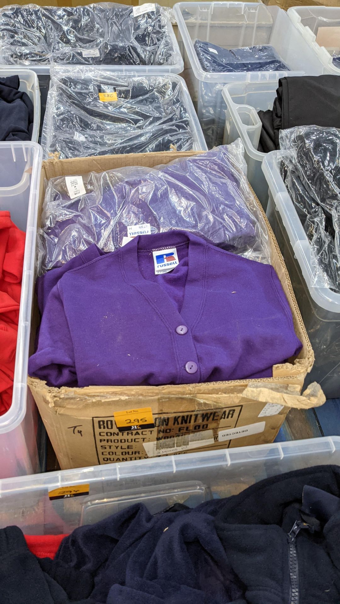 Quantity of Russell children's purple button up sweat tops - 1 large box