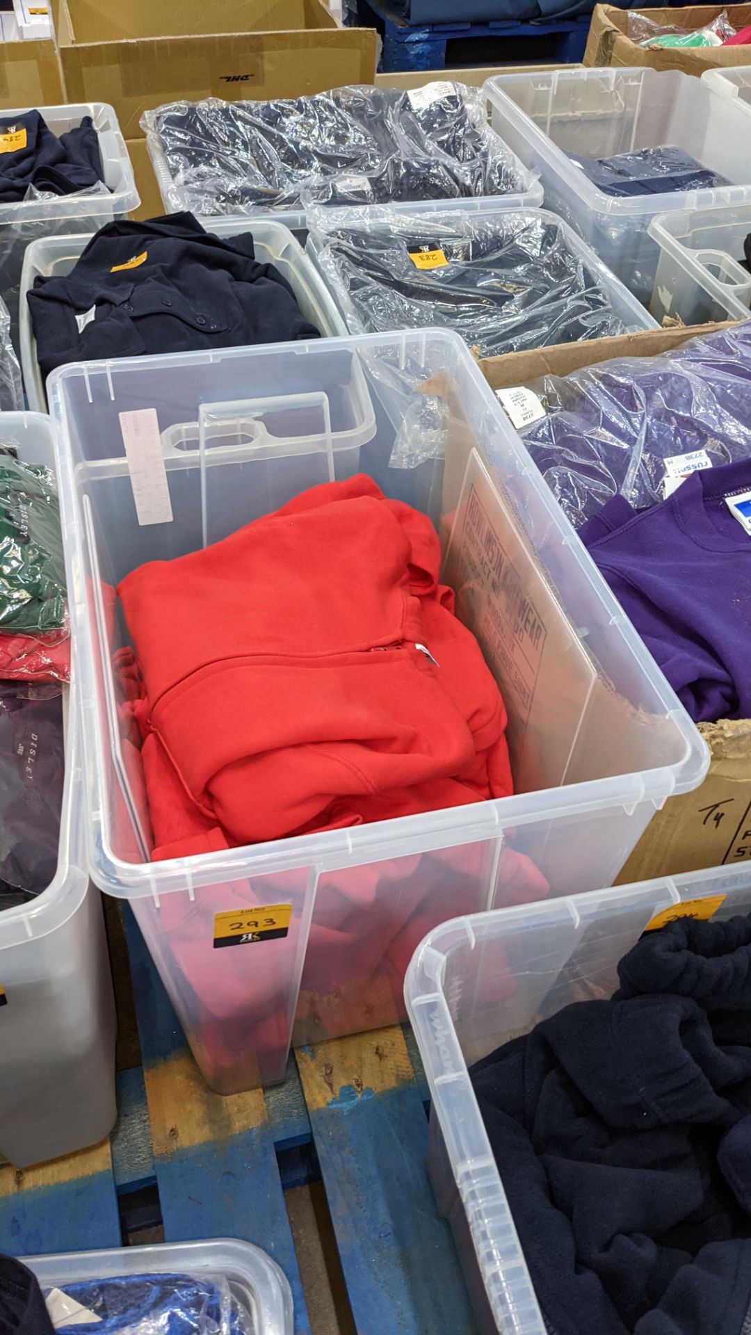 Approx 7 off children's zip up red hooded tops - the contents of 1 large crate. NB crate excluded