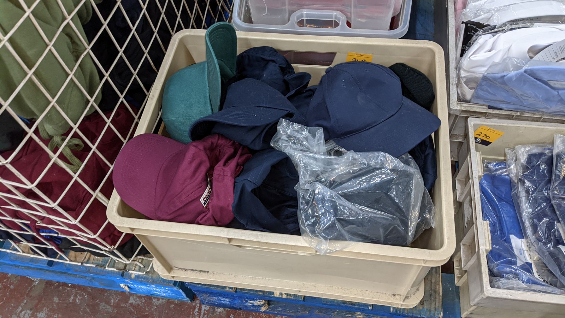 Quantity of assorted beanie hats & baseball caps - the contents of 1 crate. NB crate excluded