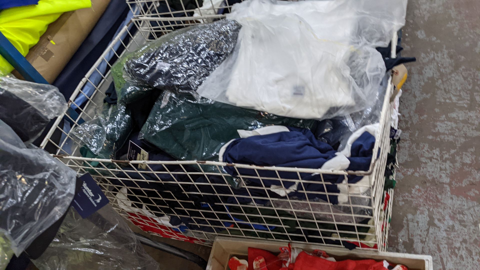 The contents of a cage of assorted adults garments. NB cage excluded - Image 3 of 6