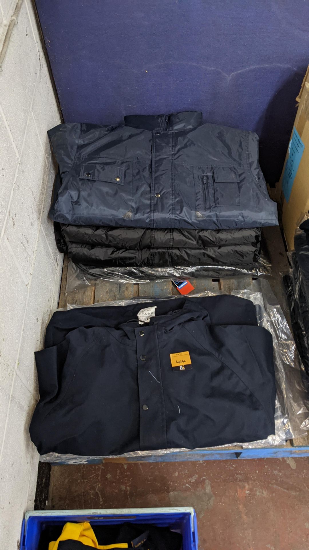 Approx 9 off assorted coats, overalls & body warmers (2 stacks)