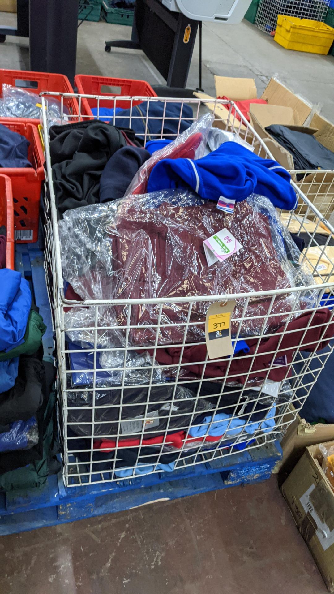 The contents of a large cage of assorted children's garments