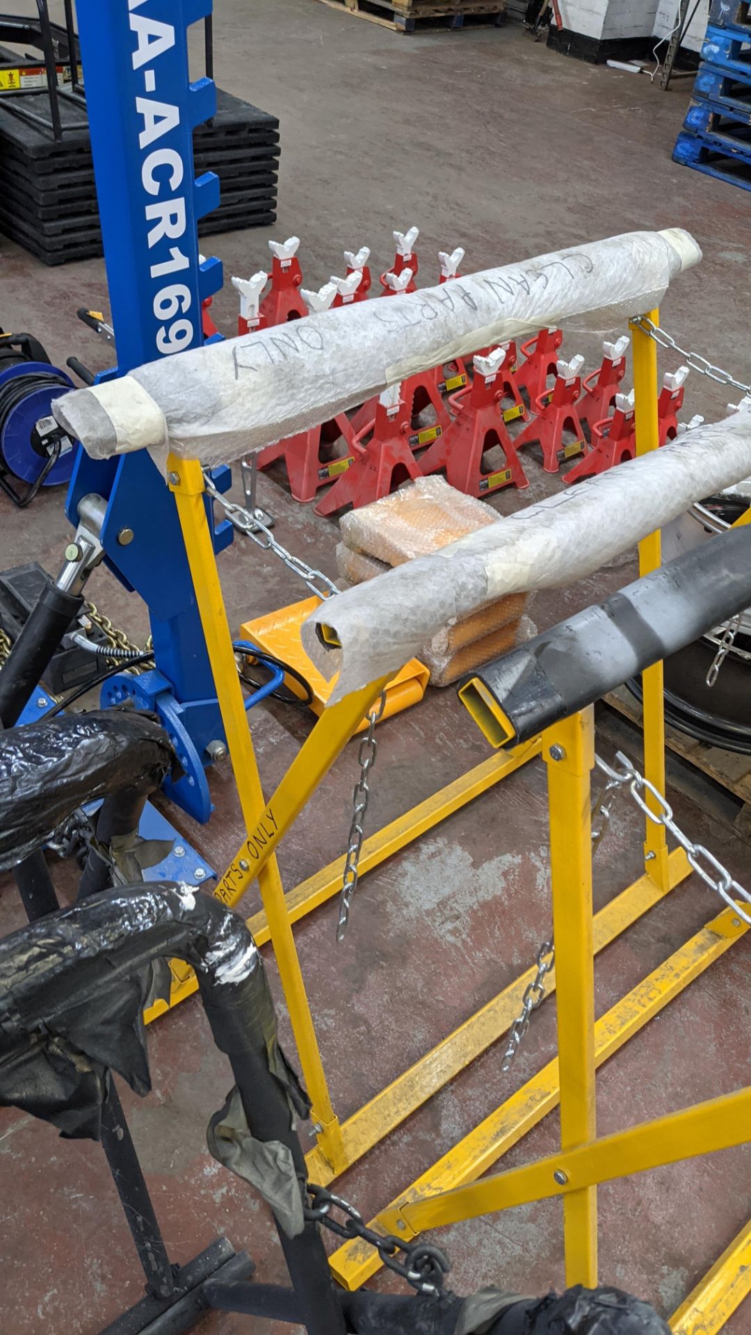 Pair of orange trestles, each being approximately 1000mm wide & 1150mm height when closed - Image 8 of 11