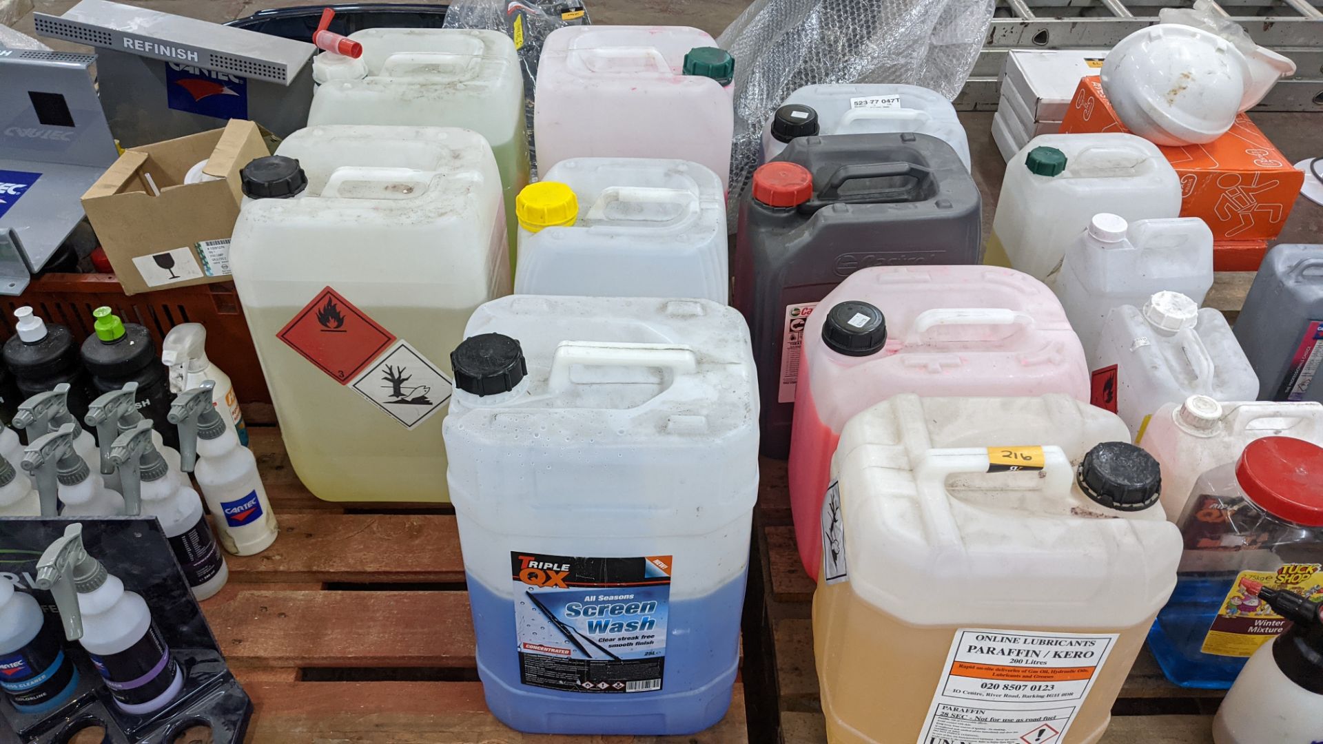 9 off assorted large drums of automotive related fluids, e.g. lubricant, screen wash, shampoo, antif