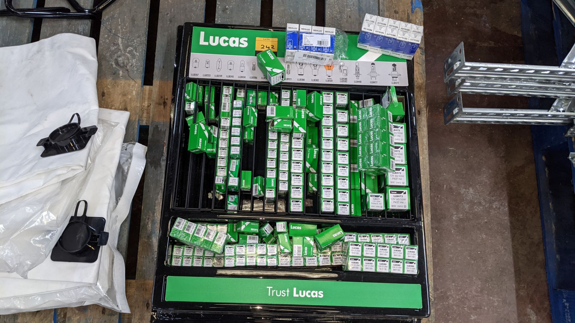 Large quantity of Lucas & Neolux car bulbs including dispensing/display stand