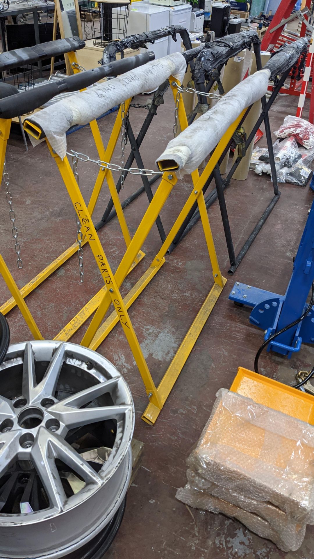 Pair of orange trestles, each being approximately 1000mm wide & 1150mm height when closed - Image 10 of 11