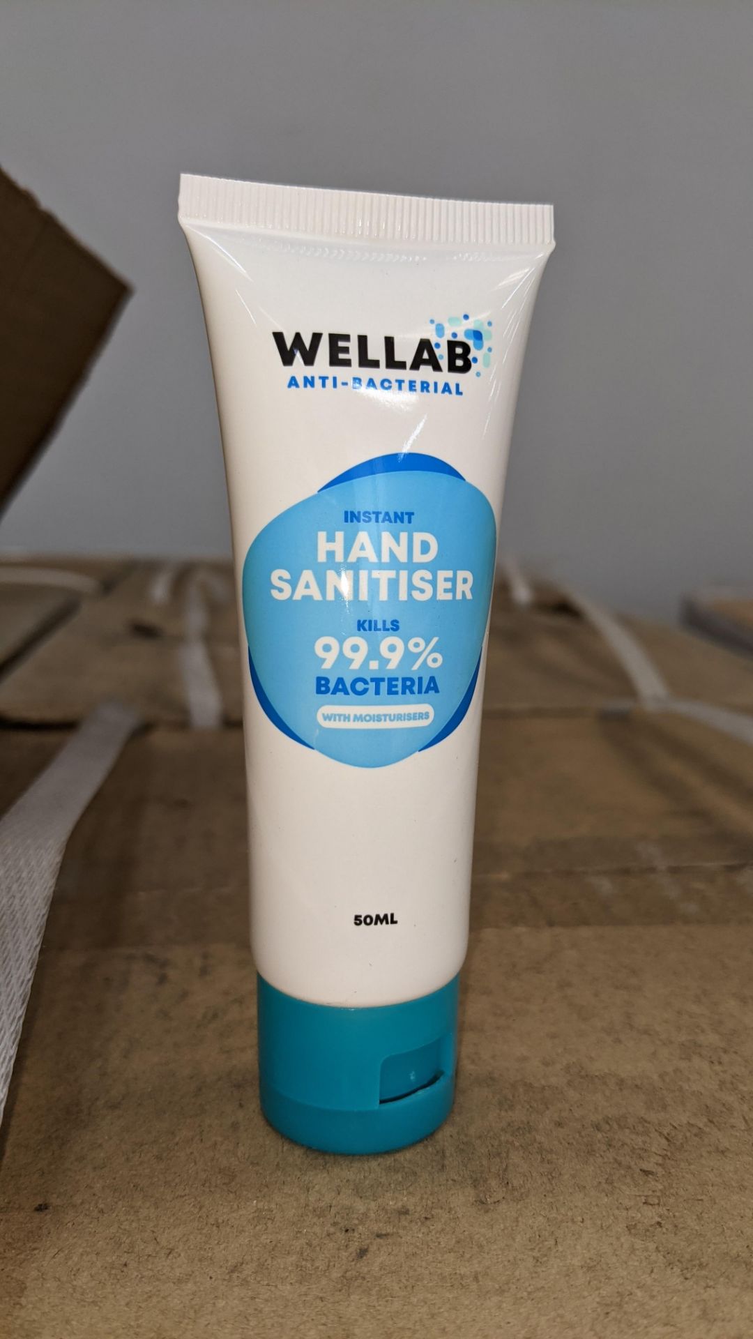 8,100 tubes of Wellab anti-bacterial alcohol based hand sanitiser. Each tube holds 50ml. 75% ethan