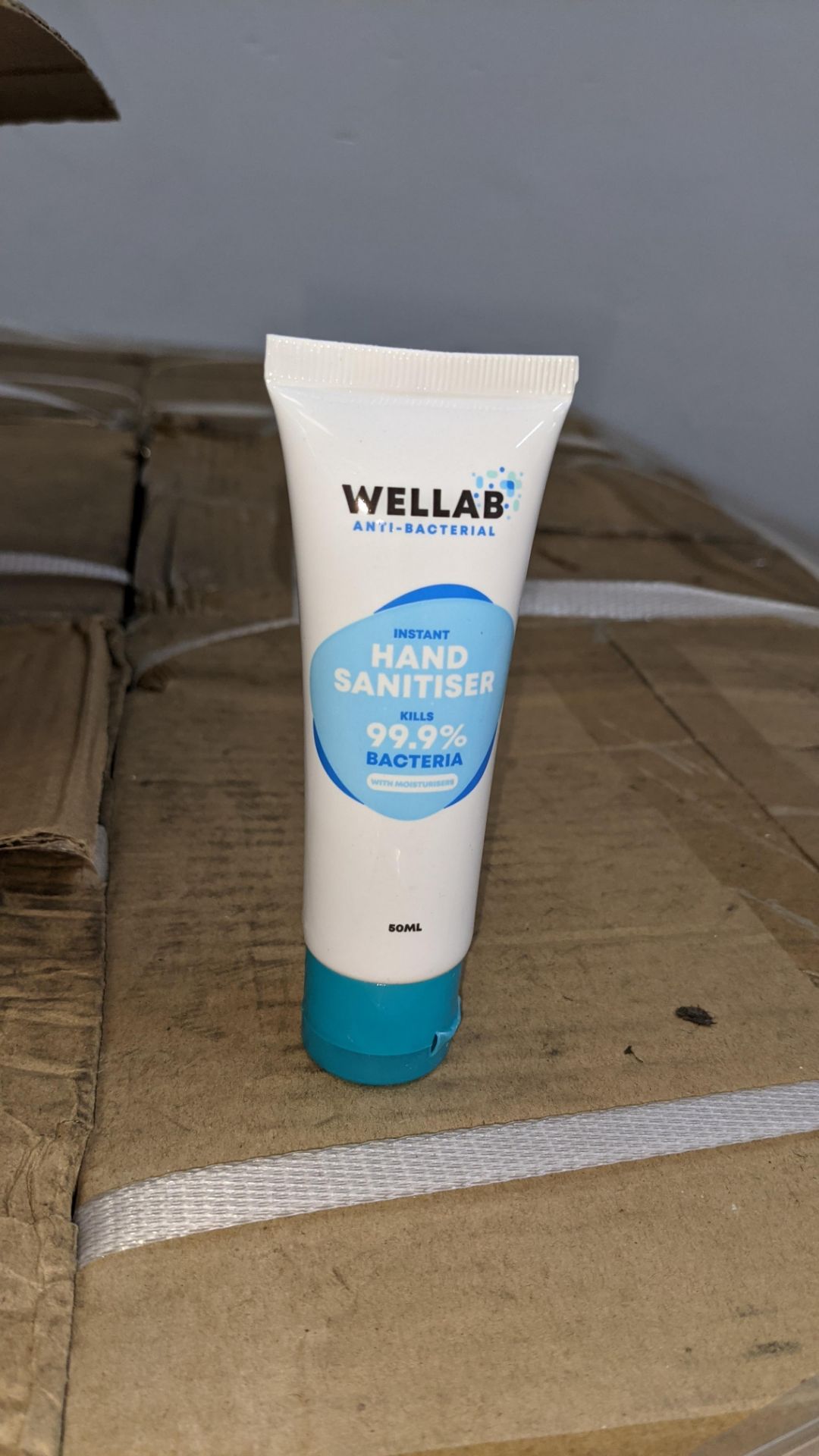 8,100 tubes of Wellab anti-bacterial alcohol based hand sanitiser. Each tube holds 50ml. 75% ethan