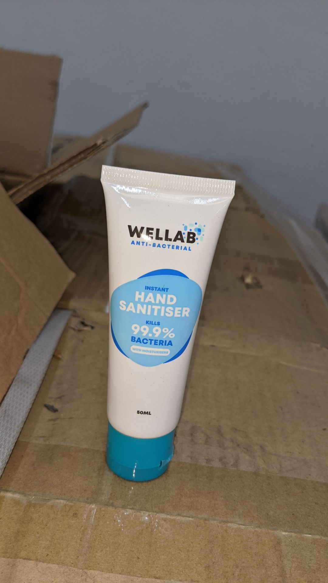 8,100 tubes of Wellab anti-bacterial alcohol based hand sanitiser. Each tube holds 50ml. 75% ethan