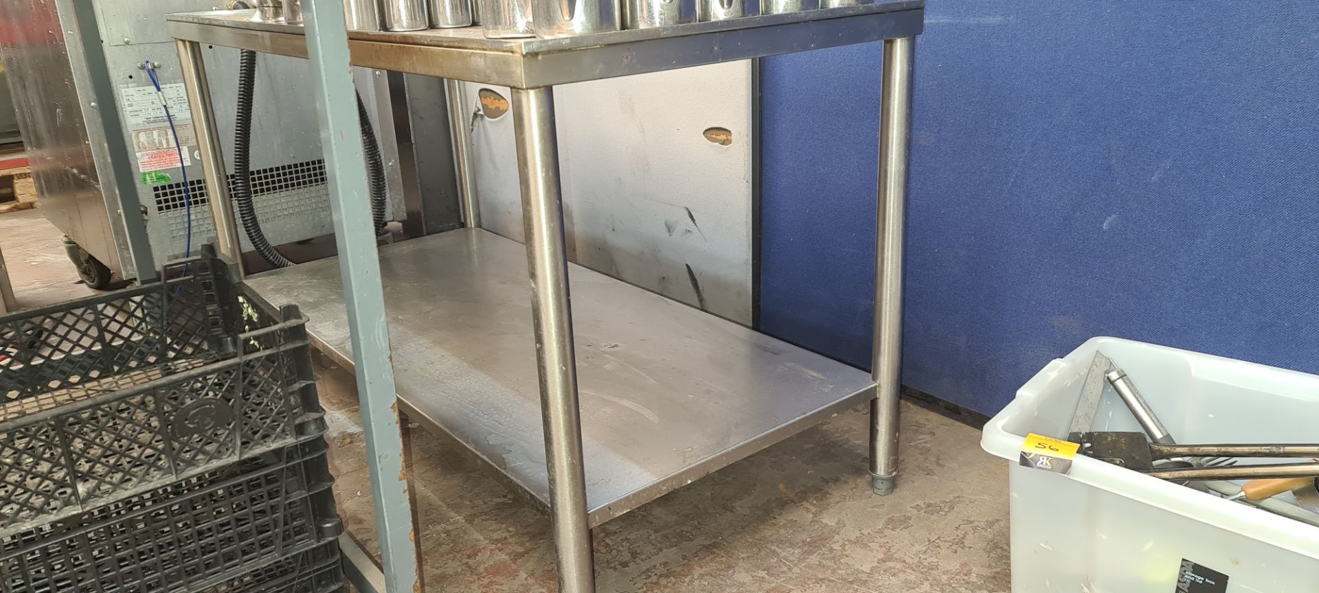 Twin tier shelving unit with small rim/upstand to 3 sides. Max. external dimensions 1200mm x 555mm x