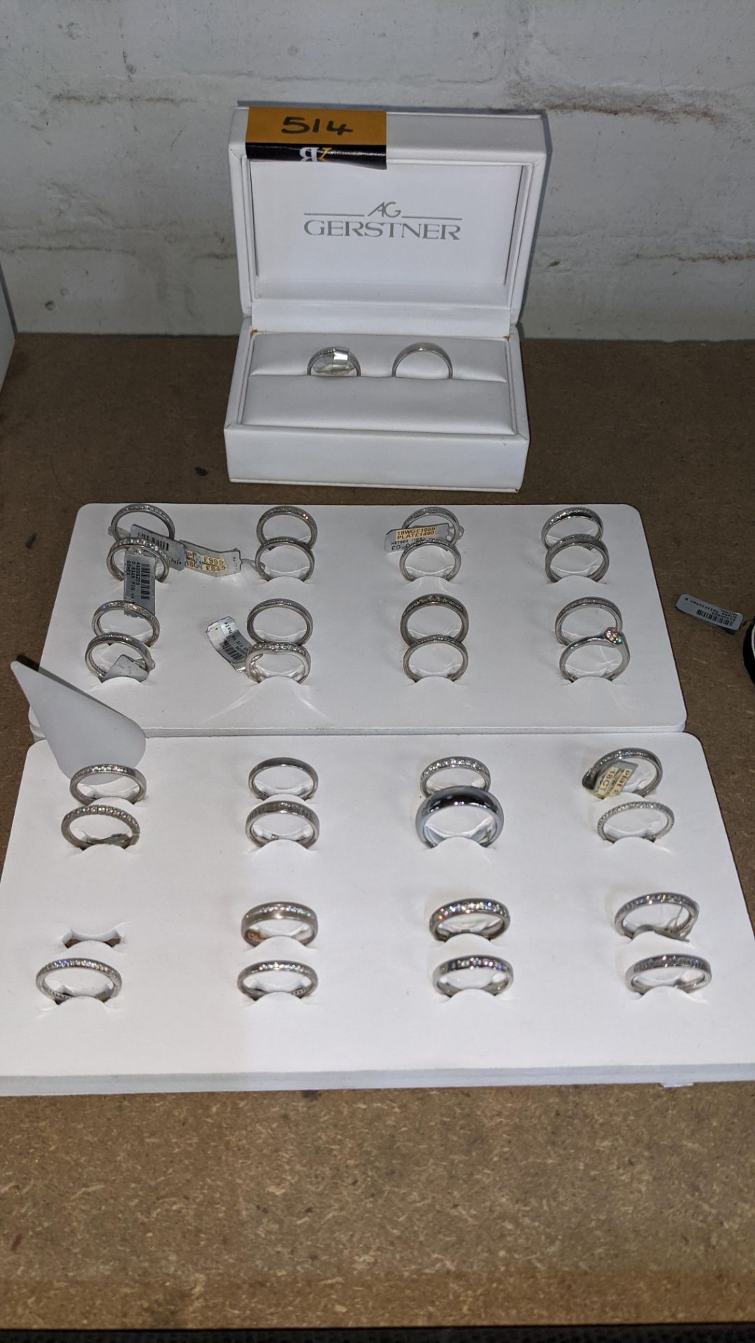 3 trays & their contents comprising approx. 33 rings, mostly in the style of eternity rings - these