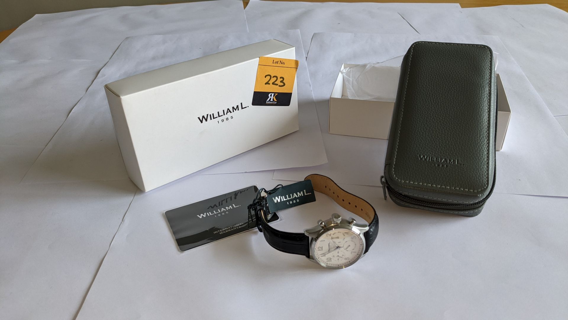 William L 1985 stainless steel watch, 5 ATM water resistant, leather strap, RRP £129. Includes box - Image 2 of 17