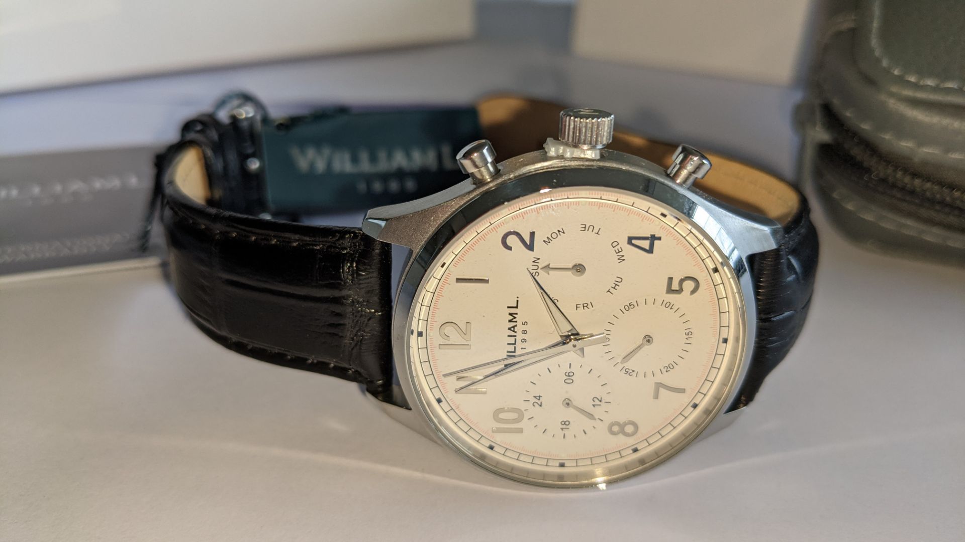 William L 1985 stainless steel watch, 5 ATM water resistant, leather strap, RRP £129. Includes box - Image 5 of 17