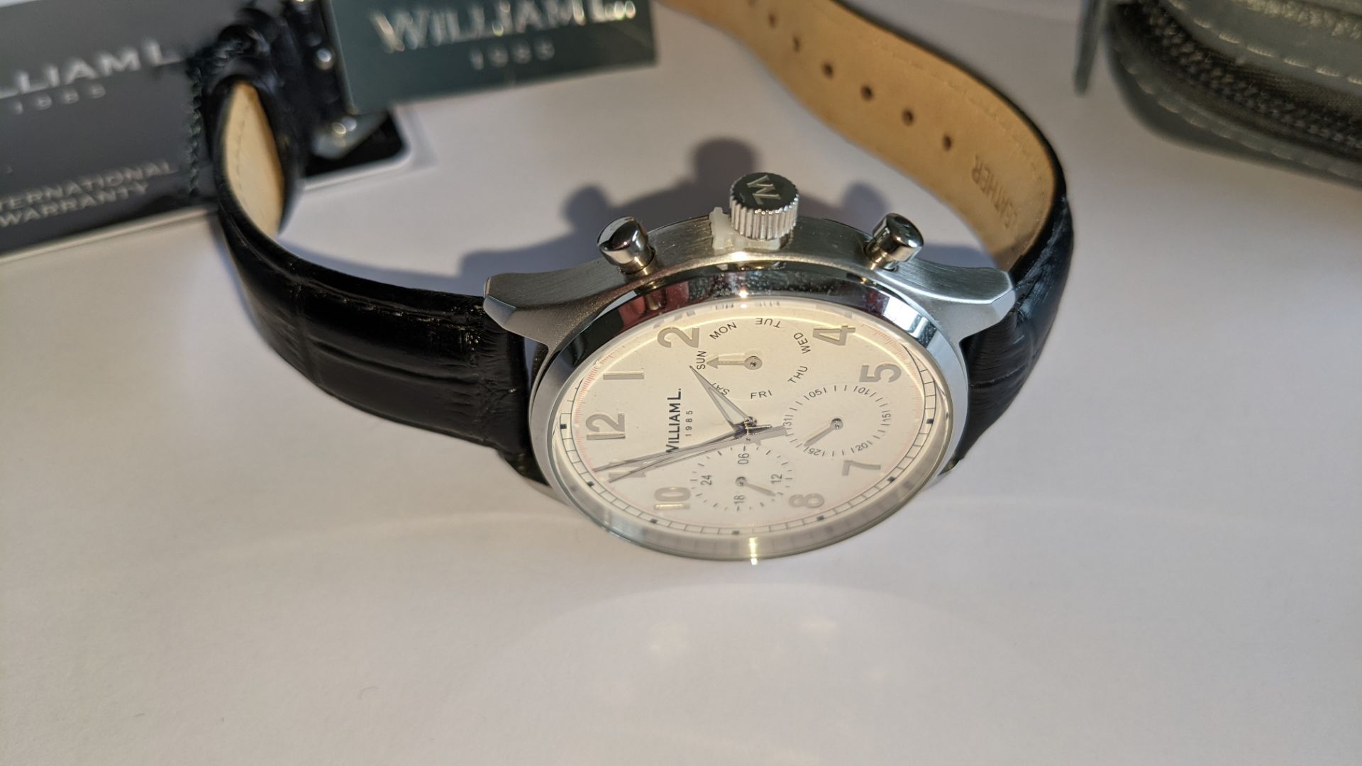 William L 1985 stainless steel watch, 5 ATM water resistant, leather strap, RRP £129. Includes box - Image 7 of 17