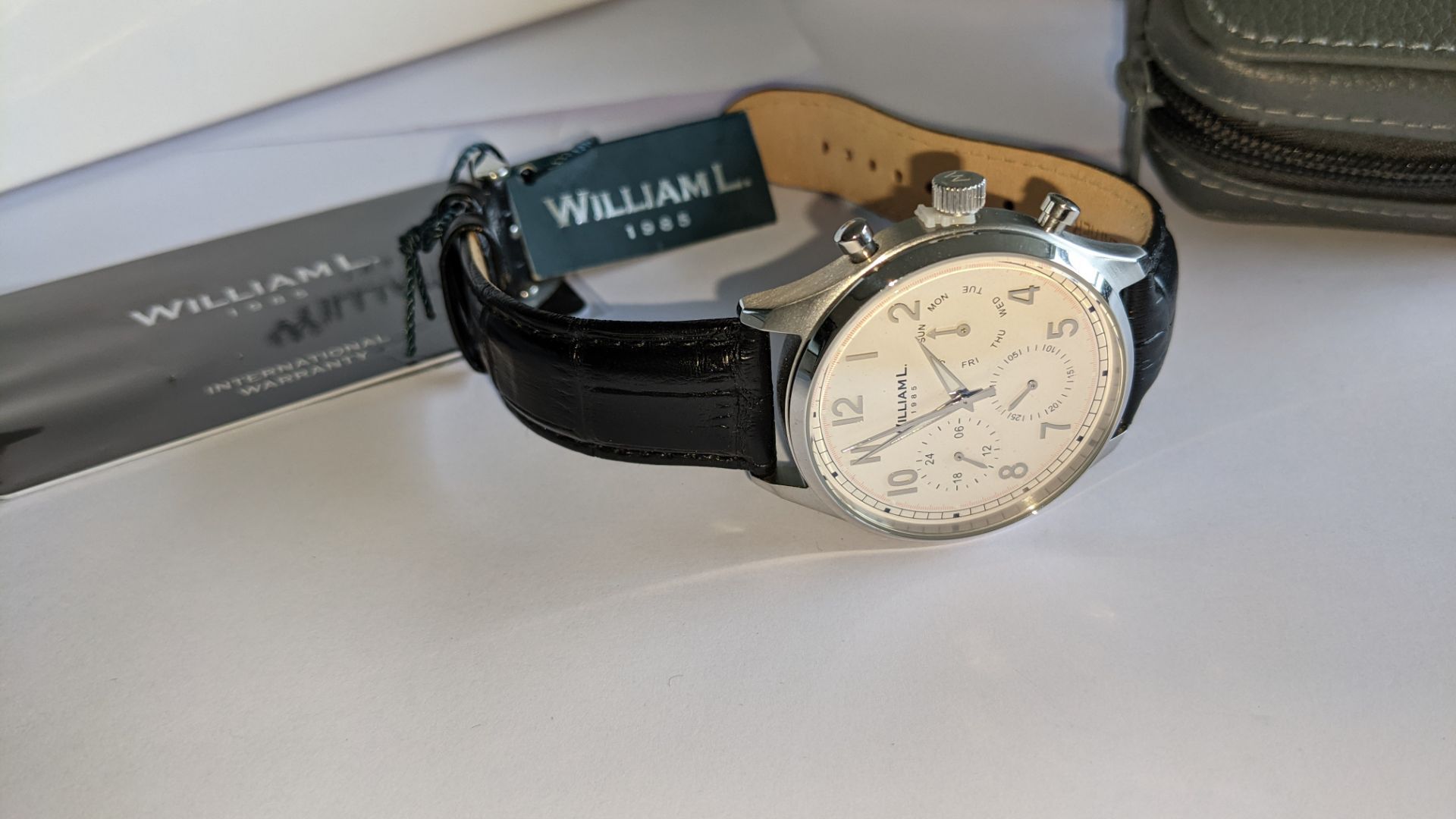 William L 1985 stainless steel watch, 5 ATM water resistant, leather strap, RRP £129. Includes box - Image 4 of 17