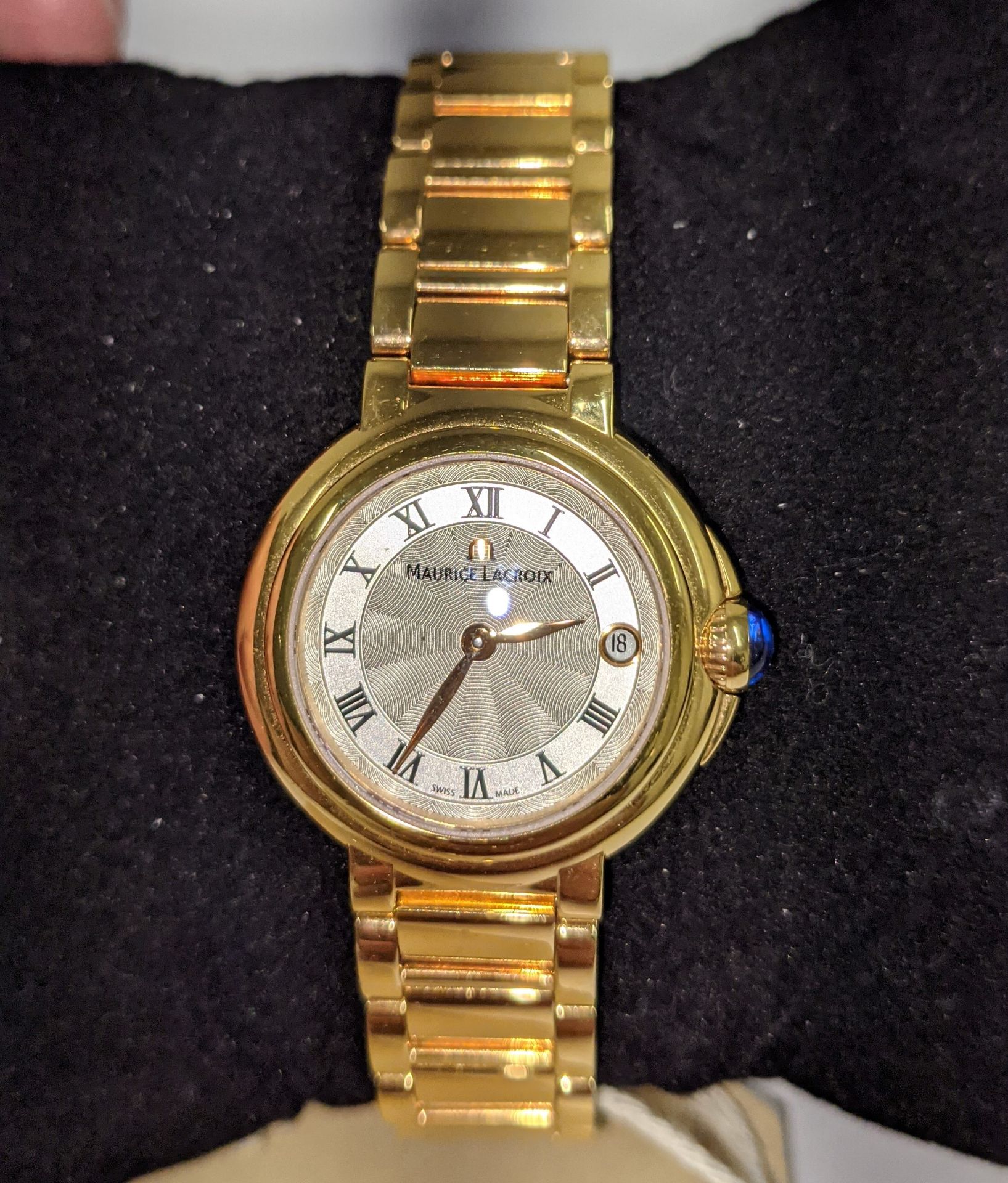 Maurice Lacroix watch in yellow gold finish. Engraved AV68055 FA1003 on the rear. Water resistant 30