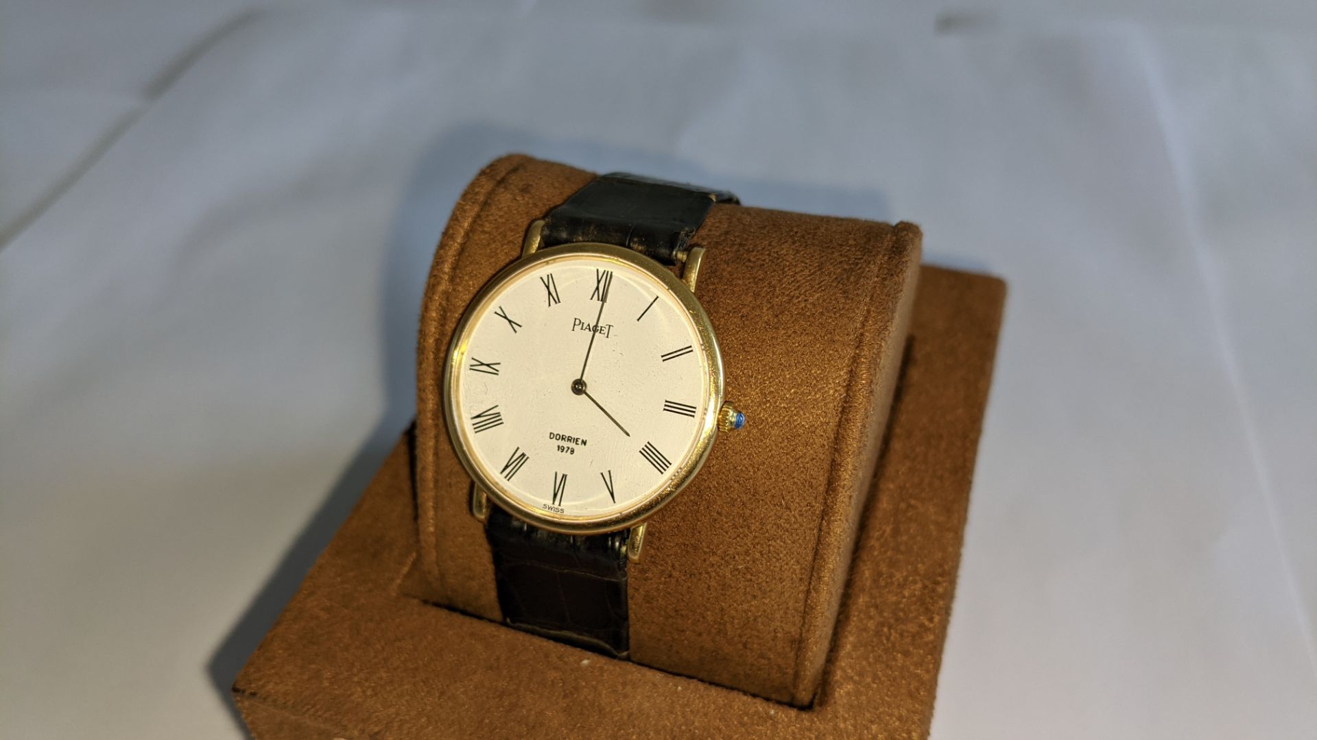 Piaget vintage yellow gold watch on leather strap. Priced (used) at £1,595. It appears to be in yell