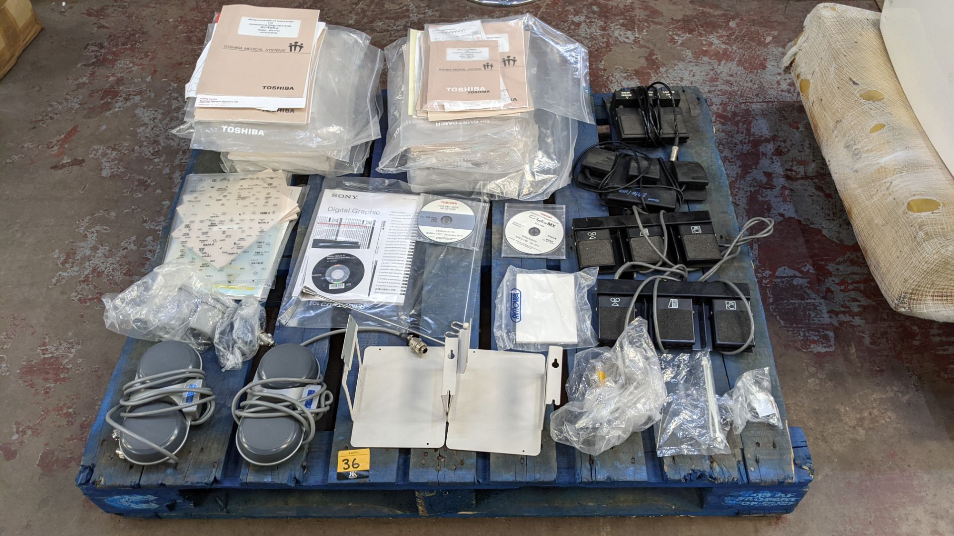 Quantity of Toshiba medical equipment manuals plus foot pedal