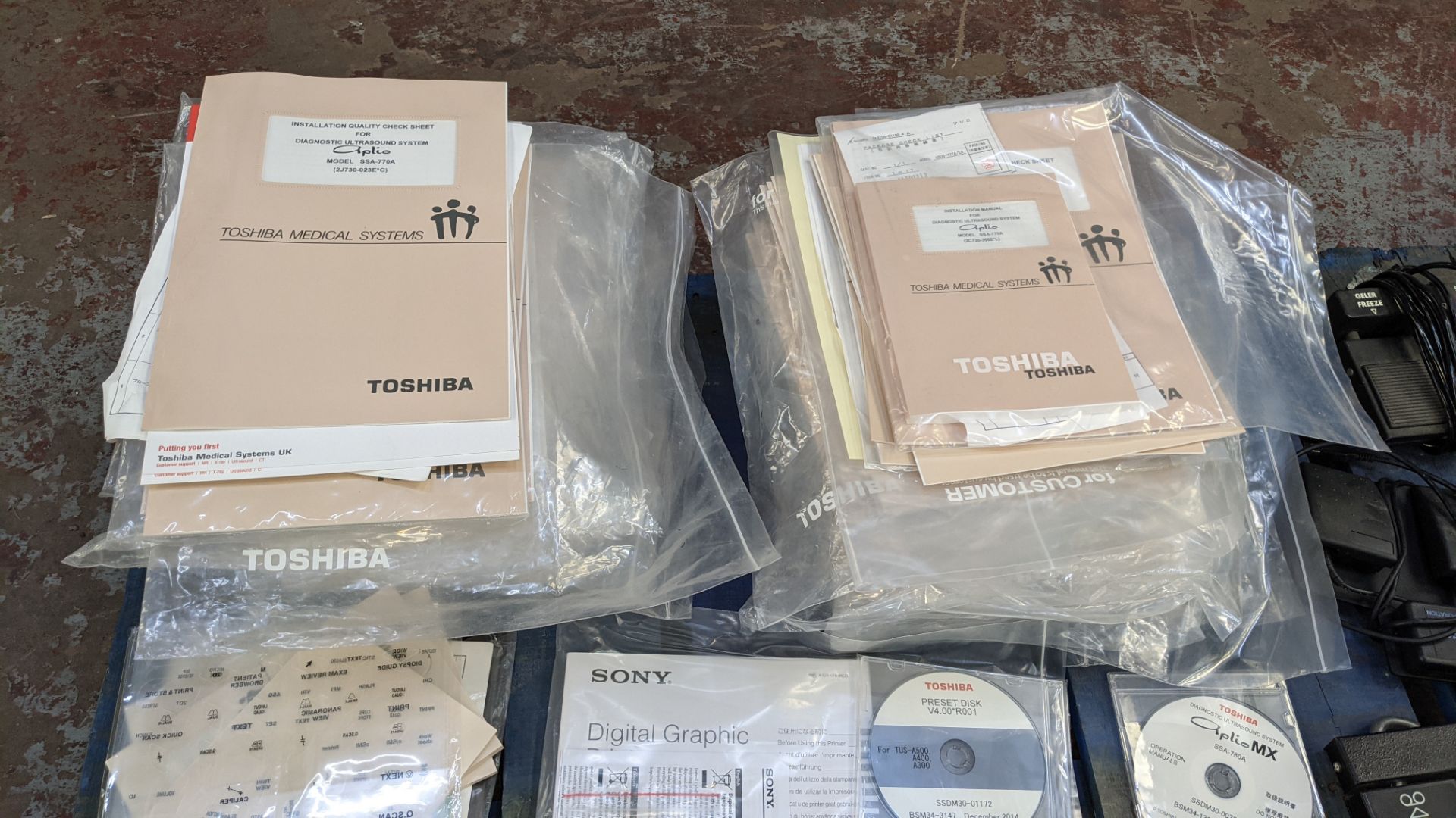 Quantity of Toshiba medical equipment manuals plus foot pedal - Image 7 of 16