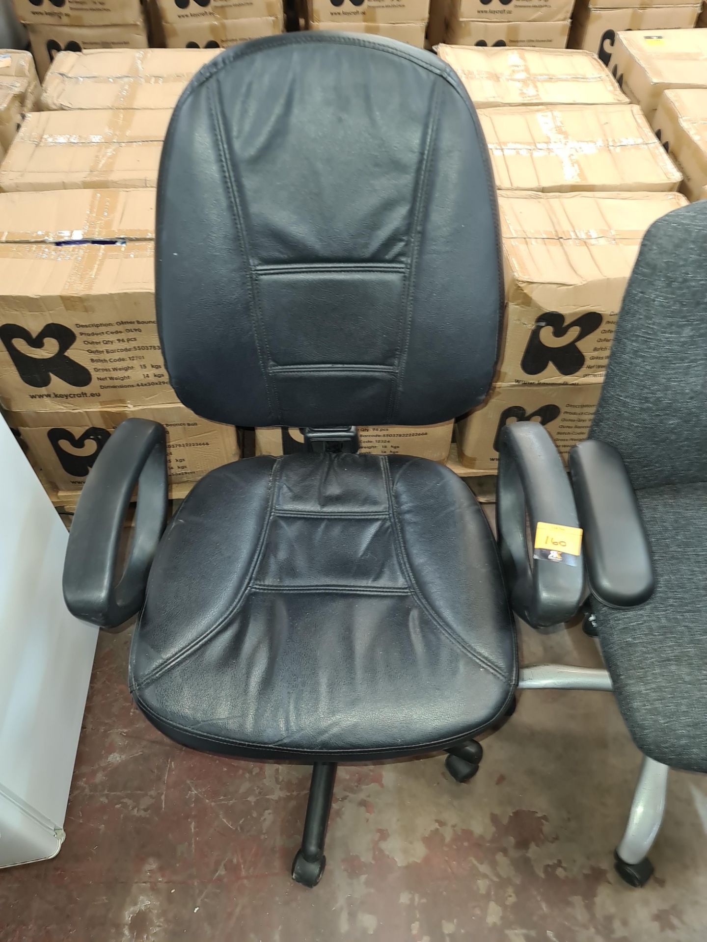 Leather operator's chair with arms