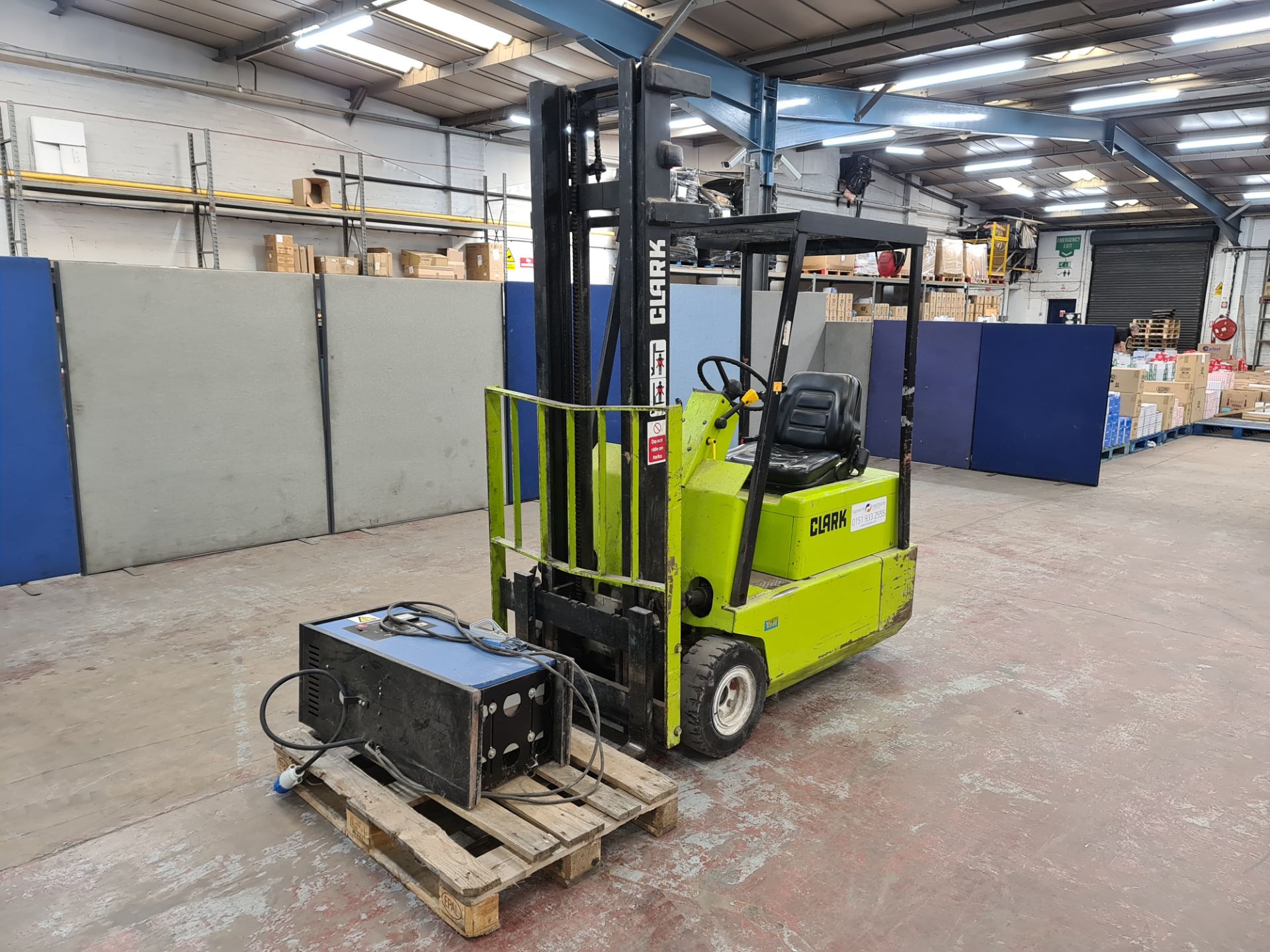 Clark 3-wheeler electric forklift truck, model TM15, 1,450kg capacity. Includes charger. This lot is