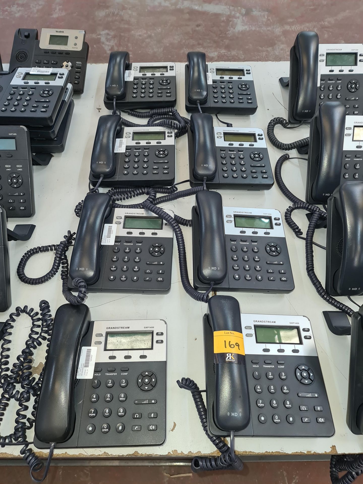 8 off Grandstream telephone handsets model GXP1450 NB. The phones in this lot do not include a desk