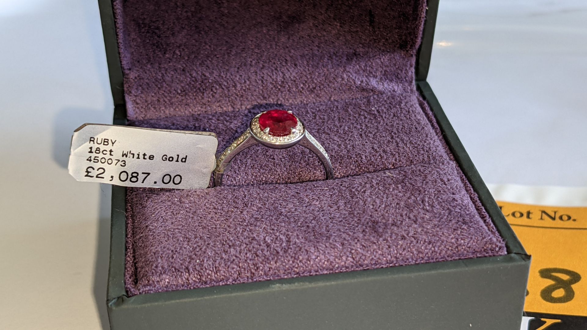 18ct white gold ring with central ruby & 0.27ct diamonds around the ruby & on each shoulder. RRP £2 - Image 3 of 14