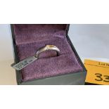 Platinum 950 ring with central diamond weighing 0.27ct & rose gold finish to small area of the mount